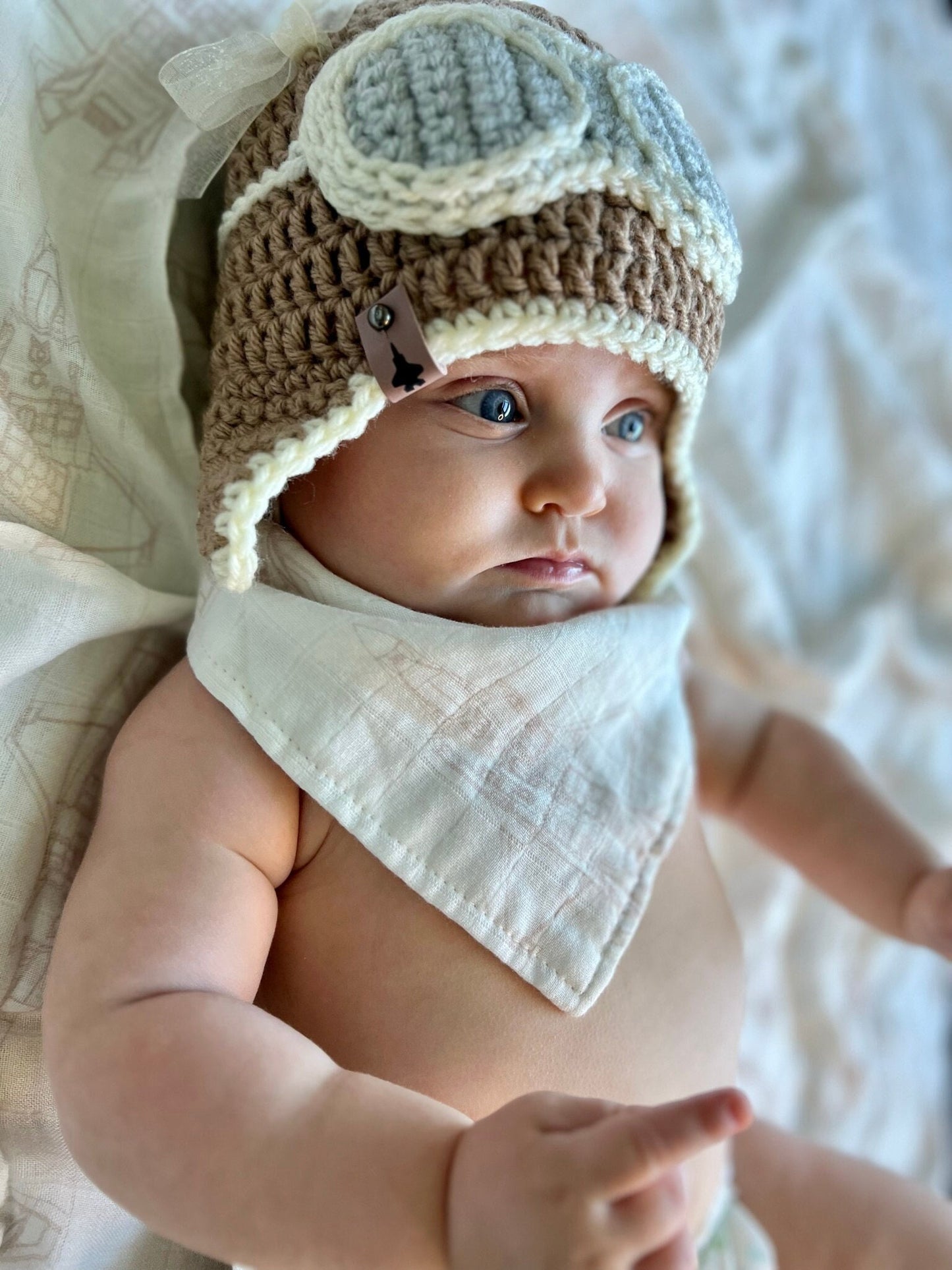 Crocheted Pilot hat with bow and mauve F-35 leather tag